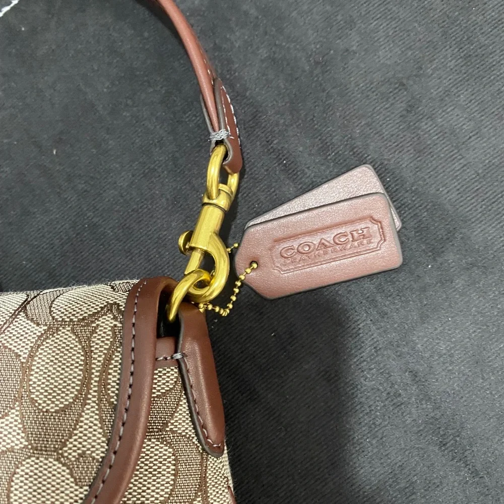 Coach Brown Signature Canvas Saddle Shoulder Bag with Gold Hardware